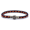 Bracelet cordon homme tressé bleu marine avec fils rouge et jaune et fermoir magnétique cylindrique