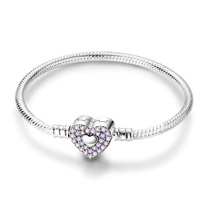 Bracelet fantaisie ado fille en argent maille serpent avec cœur cristaux roses et violets