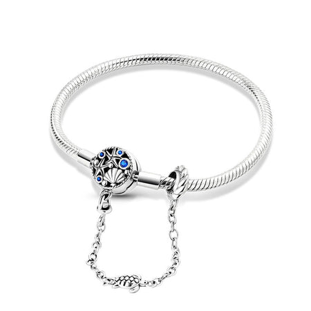 Bracelet fantaisie fille en argent aux pierres bleues avec une maille serpent un fermoir coquillage et un pendentif tortue