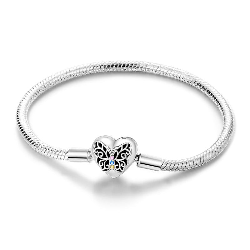 Bracelet fille 6 ans en argent au papillon ajouré avec pierres colorées jaune rose et bleu sur maille serpent