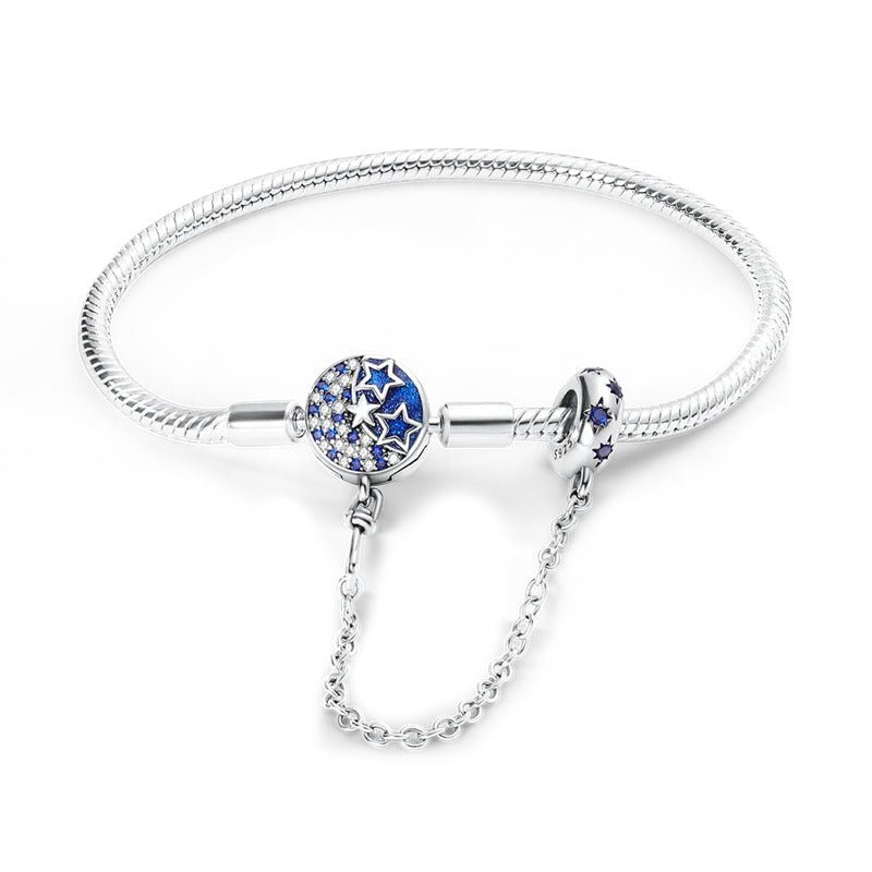 Bracelet fille 7 ans en argent sur maille serpent serti de cristaux et d'étoiles bleues avec perles émaillées