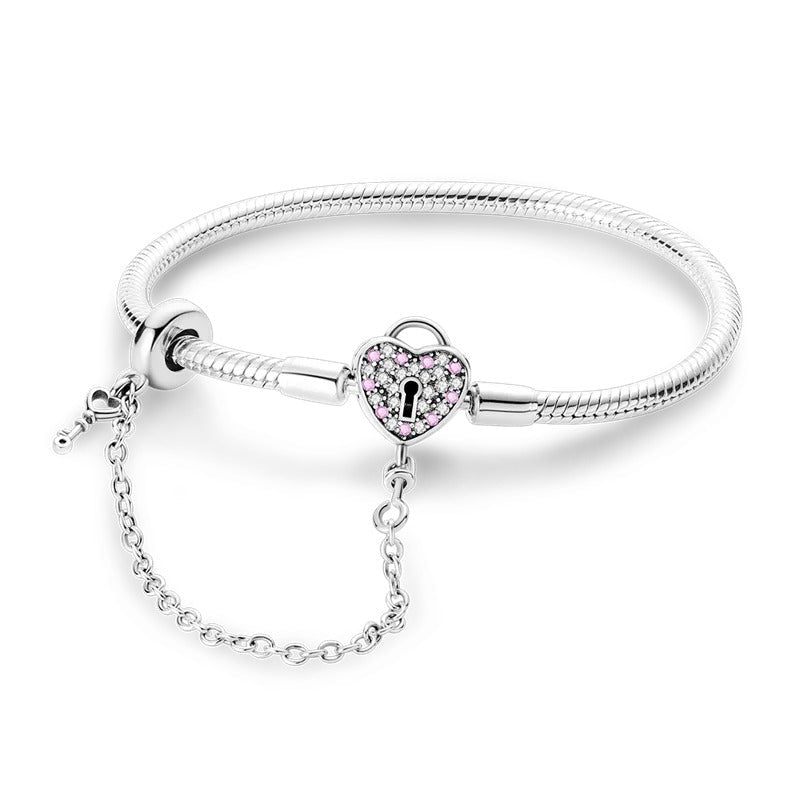 Bracelet fille 9 ans en argent chaîne serpent avec cadenas cœur orné de pierres roses facettées