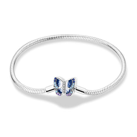 Bracelet fille argenté chaîne serpent lisse avec papillon irisé bleu et violet scintillant