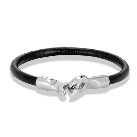 Bracelet homme cuir peau de vache noir en forme de jonc compact doté d'un fermoir menotte aimanté en acier poli argenté