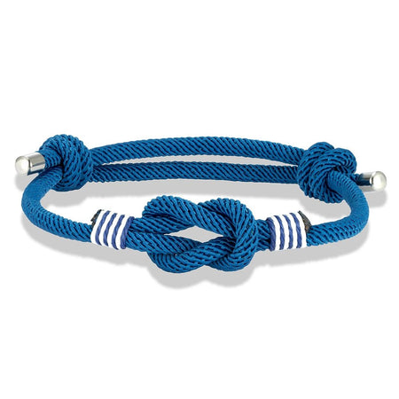 Bracelet homme en cordage nautique bleu, avec un nœud central, surliures blanches et embouts en acier