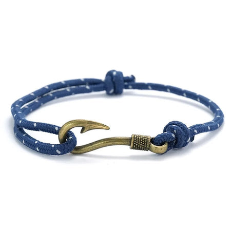 Bracelet homme marin cordon nylon tressé bleu, ponctué de fils blancs avec un fermoir hameçon doré vieilli