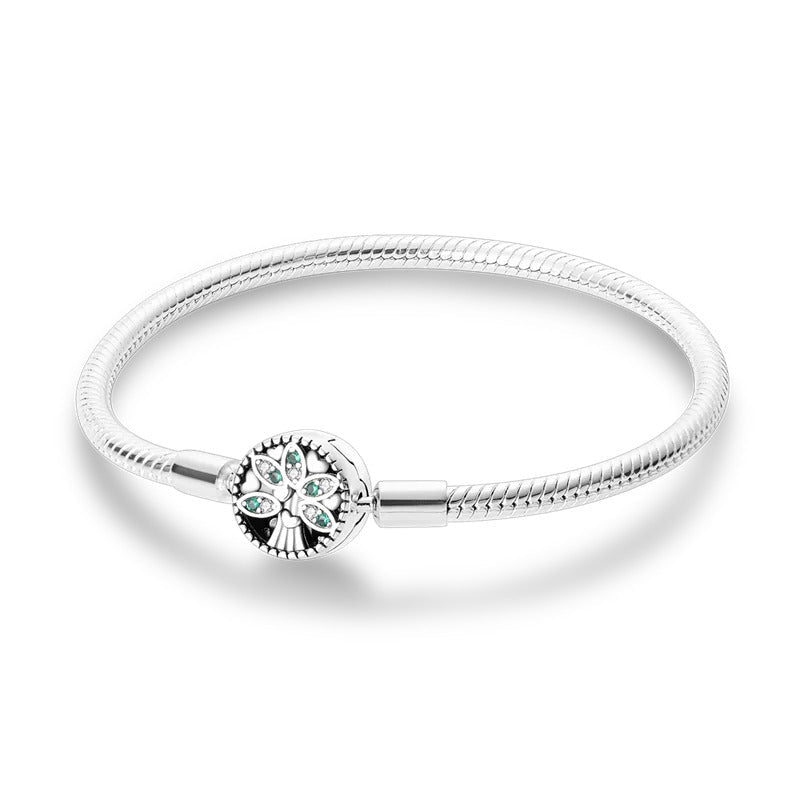 Bracelet pour fille de 10 ans en argent avec maille serpent et arbre stylisé aux cristaux verts scintillants