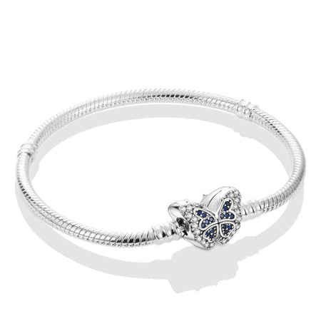 Bracelet pour jeune fille en argent à papillon central serti de cristaux bleus et transparents