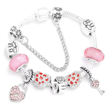 Bracelet style Pandora enfant argenté avec charms et strass roses en forme de cœur pour fille