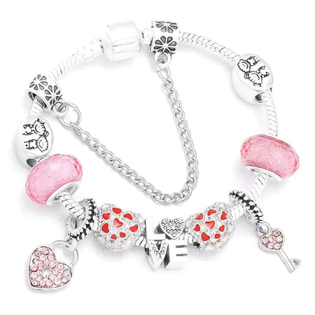 Bracelet style Pandora enfant argenté avec charms et strass roses en forme de cœur pour fille