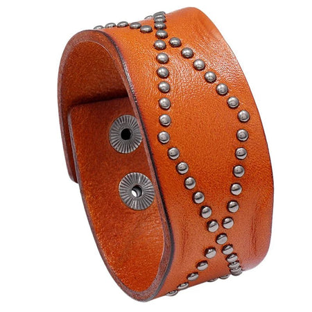 Manchette homme en cuir véritable camel ornée de rivets sombres en relief