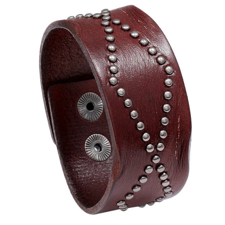 Manchette homme cuir véritable marron ornée de clous métalliques en double tracé ondulant