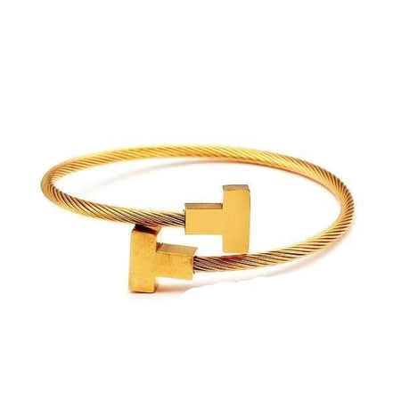 Bracelet acier pour homme pas cher jonc câble torsadé terminaisons T dorées