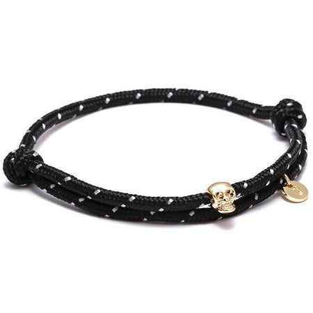 Bracelet cordon pirate textile noir tressé avec crâne doré brillant médaille gravée