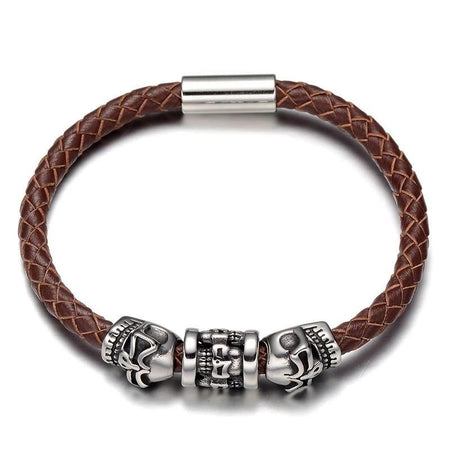 Bracelet cuir homme rock avec têtes de mort argentées et cordon tressé marron style tribal