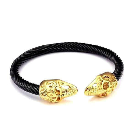 Bracelet en acier pour homme jonc torsadé noir avec crânes dorés sculptés