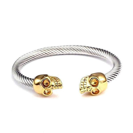 Bracelet en acier pour homme jonc torsadé argenté avec crânes dorés sculptés