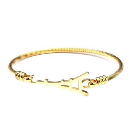 Bracelet homme acier inoxydable câble torsadé tour parisienne finition dorée