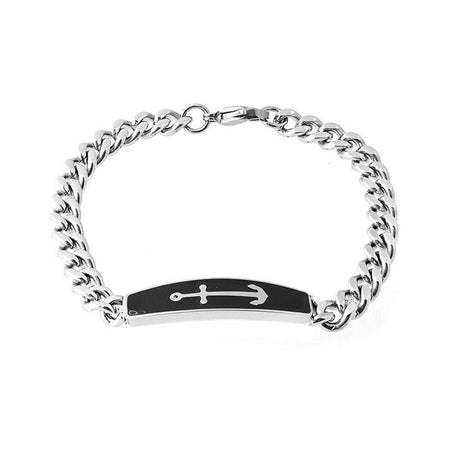 Bracelet homme gourmette argentée avec plaque ancre marine noire, maillons robustes et fermoir mousqueton sécurisé