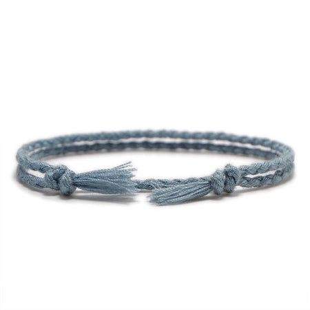 Bracelet homme cordon fin tendance double brin bleu clair tressé franges légères ajustable