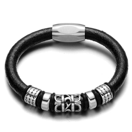 Bracelet homme cuir noir texturé avec ornements acier poli et motifs tribaux ajourés
