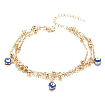 chaîne de cheville en perles dorées